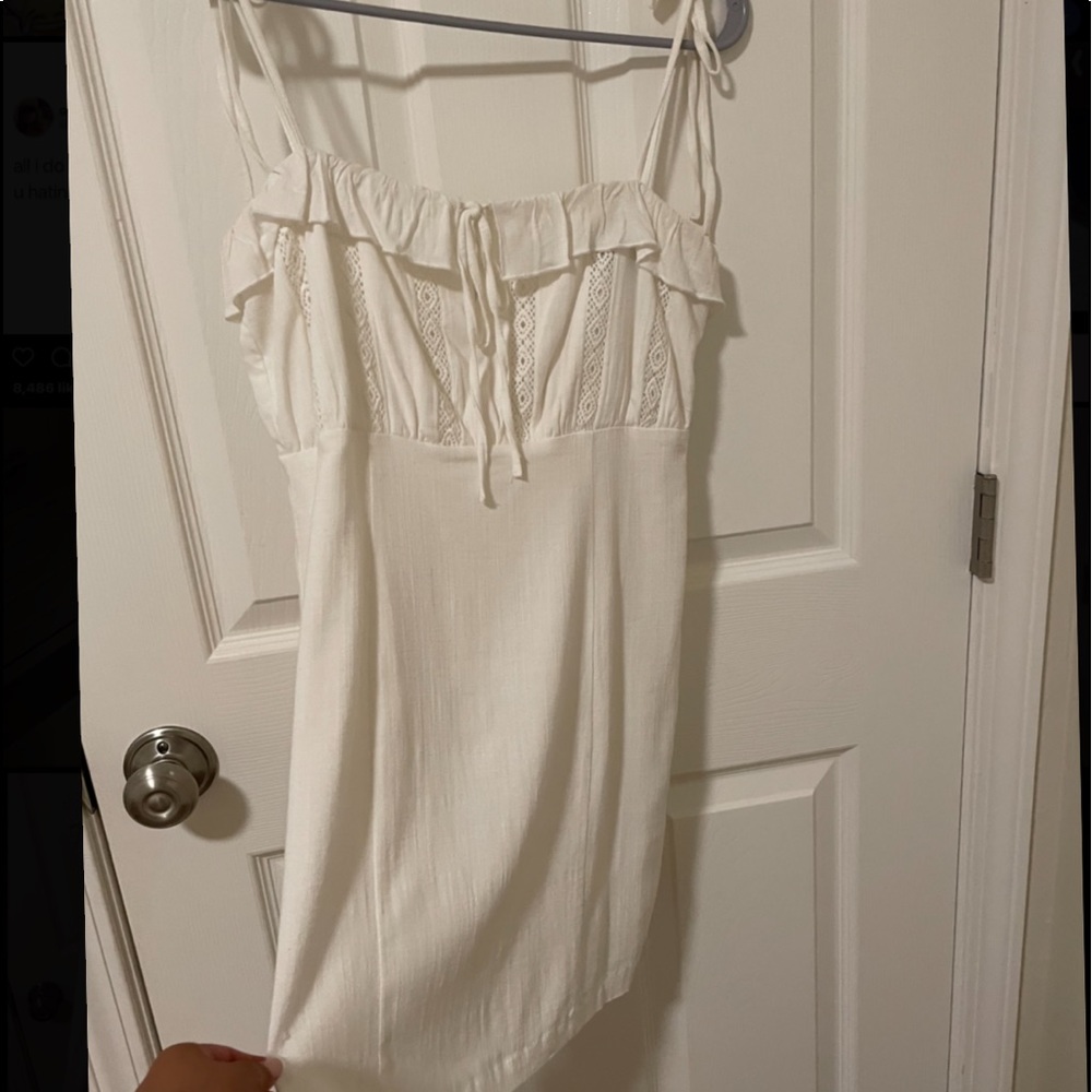 selling a cute mini white dress from forever 21
